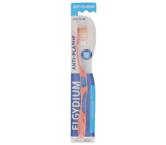 Brosse à dents medium anti-plaque Elgydium - une brosse à dents